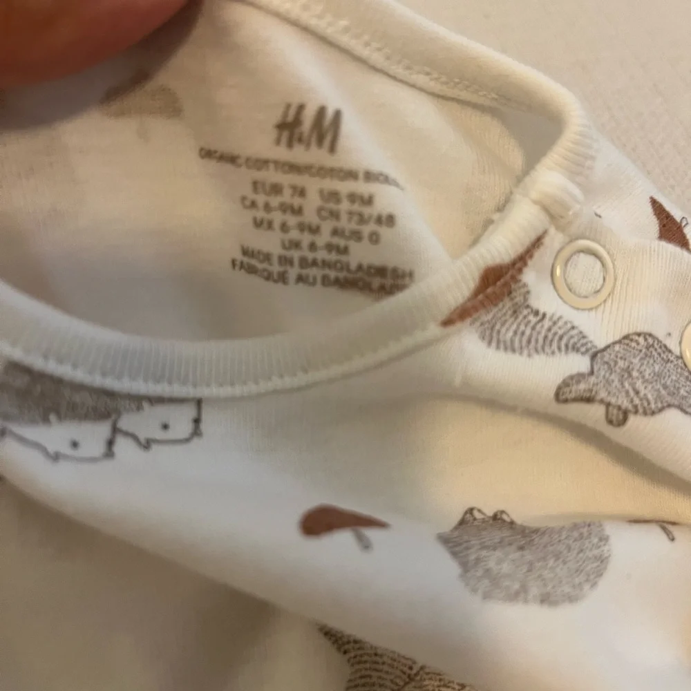 H&M woodland onesie and hat